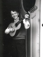 Chris age 12 outside his front door